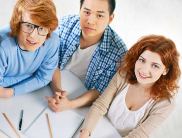 Students by desk